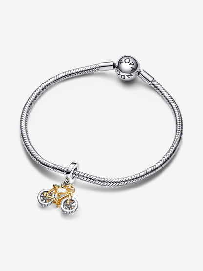 Two-tone Spinning Wheels Bicycle Dangle Charm
Sterling silver, 14k gold plating