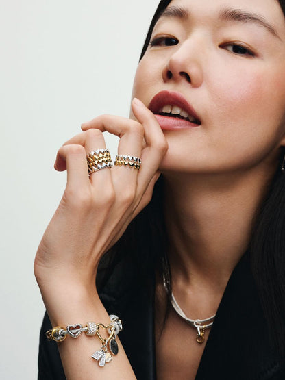 Heart Closure Snake Chain Bracelet
Sterling silver, 14k gold plating